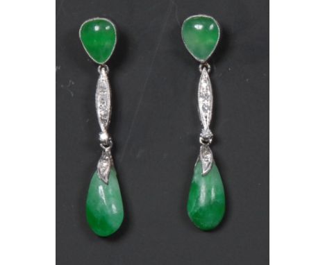 A pair of diamond and jade droplet earrings, inverted pear green jade cabochon top stone suspending an articulated five stone