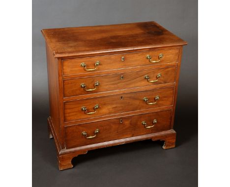 A small George III mahogany chest, moulded oversailing top above four long graduated cockbeaded drawers, swan neck handles, s