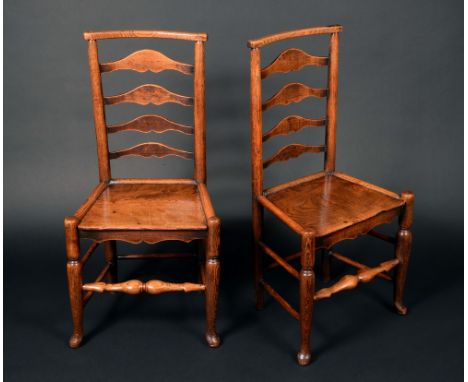 A pair of 19th century elm ladder back side chairs, solid seats, turned stretchers, pad feet, Shropshire/Staffordshire, c.184