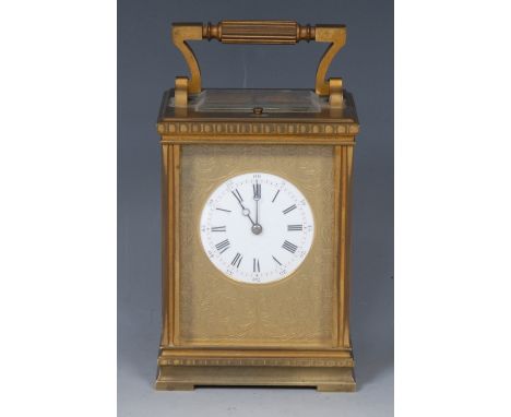 An early 20th century French carriage clock, 5cm white enamelled dial, with Roman and Arabic numerals, within gilt plate engr