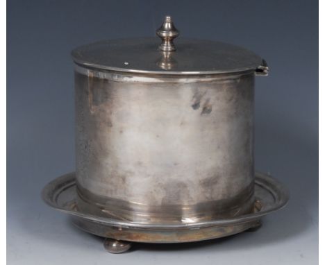 A Victorian silver cylindrical biscuit box, hinged cover with knop finial, bright-cut engraved with a shield shaped cartouche