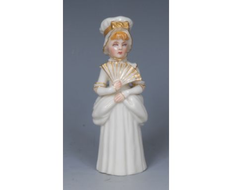 A Royal Worcester candle snuffer, Town Girl, modelled as a Victorian lady holding a fan, picked out in gilt, 10cm high, print
