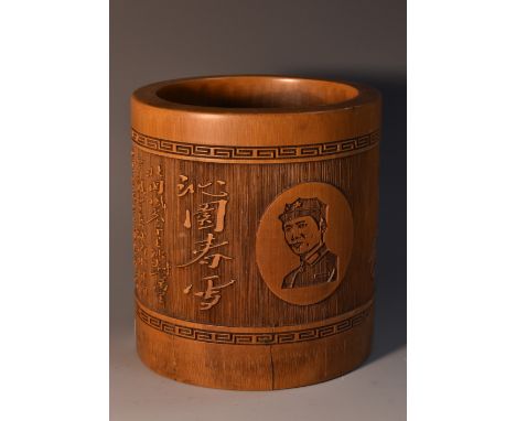 A Chinese post-Republican bamboo bitong brush pot, carved in relief with verse and a portrait of Chairman Mao Zedong, 11.5cm 