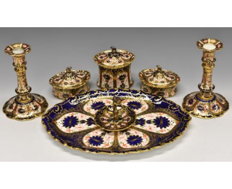 A Royal Crown Derby 1128 pattern dressing table set, comprising candlesticks, large waisted jar and cover, two oval low trink