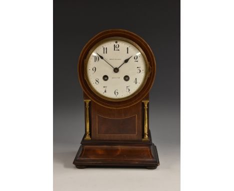 An Edwardian mahogany drum head mantel clock, 11cm convex enamel dial inscribed Pearce & Sons [Ltd], Leicester, twin-winding 