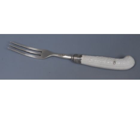 A Chelsea cutlery handle,  Gotzkowsky type moulding, silver three pronged fork, 1762 