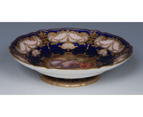 A Royal Worcester low comport, painted by Richard Seabright, signed, with ripe damsons, red berries and foliage, within a jew