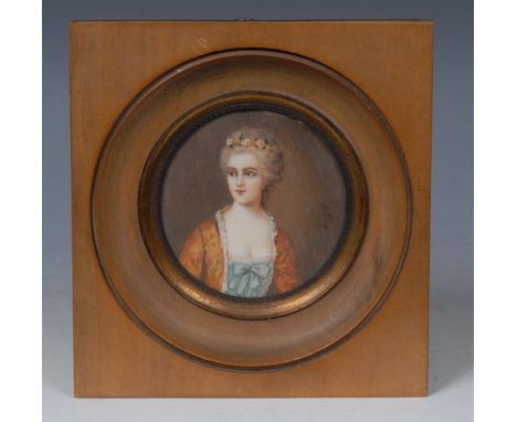 English School, 19th century, a portrait miniature, of a lady with floral chaplet, circular on ivory, 6.5cm diam,wooden frame