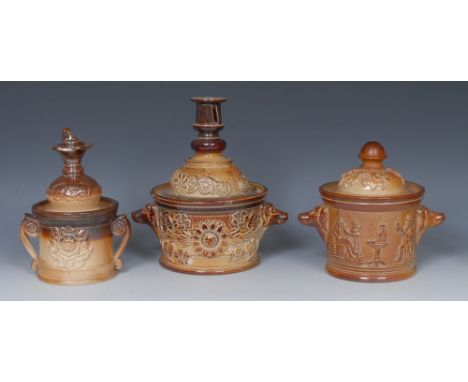 A 19th century Brampton brown salt glazed stoneware tobacco jar, inner cover and cover, in relief with jolly topers, dog hand