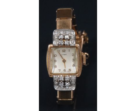 Cyma - a vintage lady's diamond set cocktail watch, square dial, Arabic numerals, gilt hands, 18ct yellow gold case, flanked 