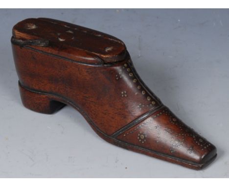 A 19th century mahogany novelty snuff box, as a shoe, decorated with brass pinwork, sliding cover, 11.5cm long, c.1820