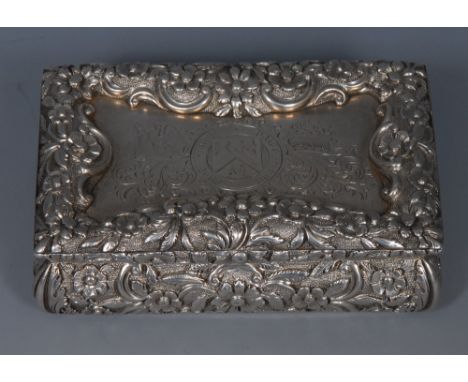 A large William IV silver bowed rectangular snuff box, boldly chased with borders of flowers and scrolls, the hinged cover cr