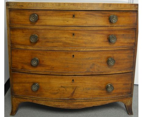 A George III mahogany bow fronted chest,  of four graduating cock beaded drawers satinwood and ebony inlay to frieze, bracket