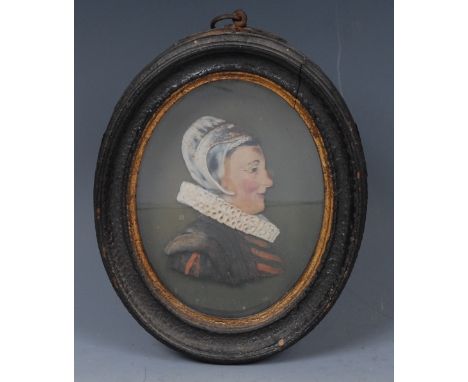 A late 18th/early 19th century wax portrait profile, of a 16th century lady, bust-length, fully turned to dexter, wearing cap