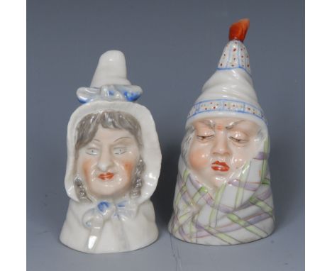 A Royal Worcester candlesnuffer, Mr Caudle, wearing a night cap and blanket, lightly coloured, 8cm high, printed crown and ci