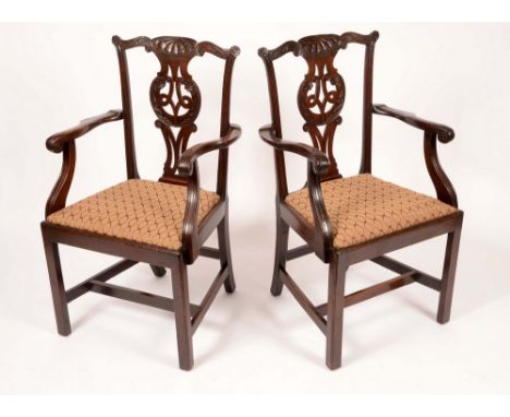 A pair of Chippendale design mahogany 'armchairs', cupid's bow cresting rail and shaped and pierced splats carved with flower