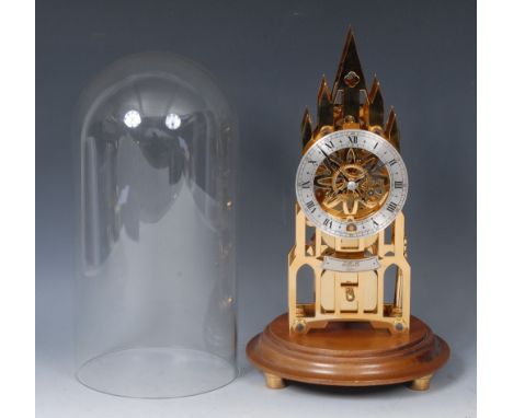 A 20th century Elliott brass skeleton clock, of architectural form, silvered chapter ring, with Roman numerals, fusee movemen
