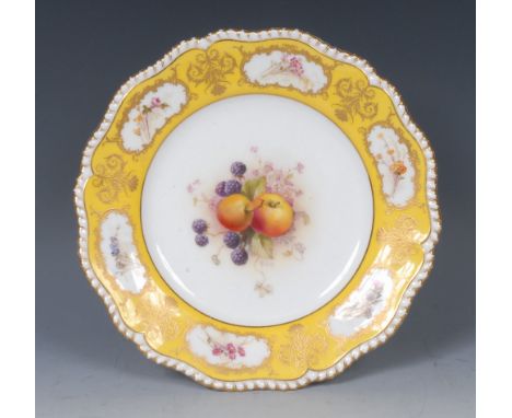 A  Royal Worcester shaped circular plate, painted by William Ricketts, signed, with apples and blackberries, the rim with six