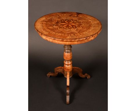 A 19th century Italian/Maltese walnut and parquetry tripod centre table, circular top inlaid with stars and geometric motifs,