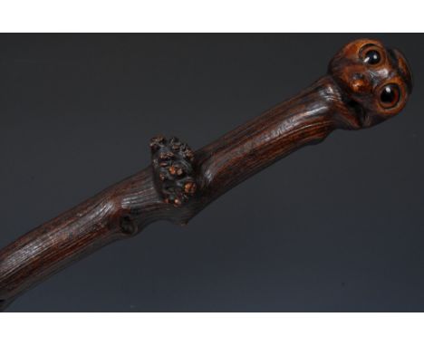 Folk Art - a novelty gnarly wood walking stick, the burr pommel as an owl, inset glass eyes, brass walking tip, 90.5cm long