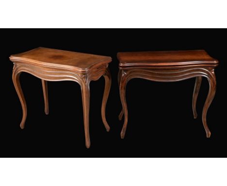 A near pair of 19th century rosewood serpentine card tables, each with folding top enclosing an inset baize lined playing sur