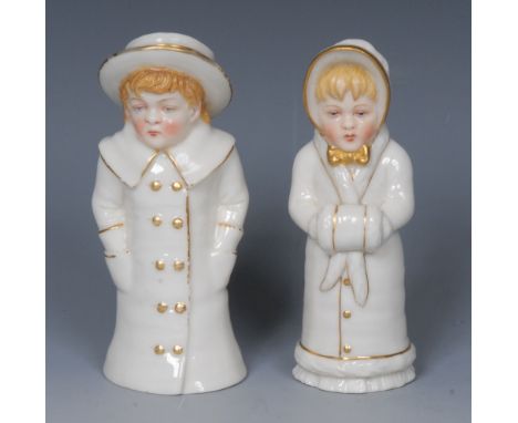 A pair of  Royal Worcester candlesnuffer, Girl with a Muff and Boy with a Boater, picked out in gilt, 10cm high, printed crow