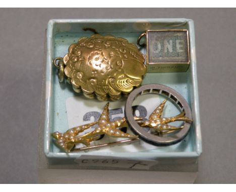 9ct Gold £1 Charm, Yellow Metal Locket and Eternity Ring plus and Art Deco Swallow Brooch