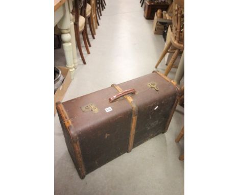 Vintage Wooden Bound Travelling Trunk together with a quantity of old newspapers