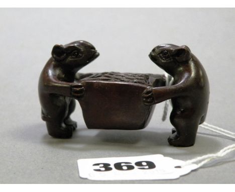 Signed wood netsuke of two mice carrying basket of food