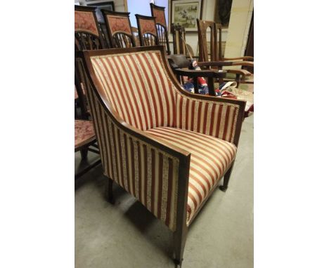 Edwardian Upholstered Salon Armchair on brass and ceramic castors