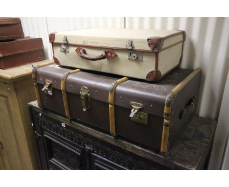 Three Vintage Suitcases and a Trunk