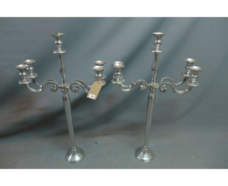 A pair of large chrome five light candelabras. H.99cm 
