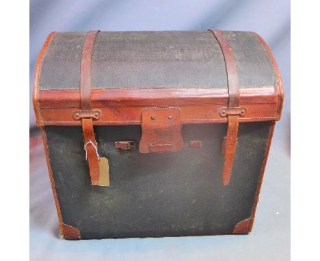 A late 19th/early 20th century Moynat leather dome top travelling trunk. H-72 W-75 D-51cm 