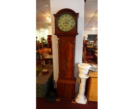 A 19th century mahogany longcase clock, the round painted dial with Roman numerals, the mahogany case with broken arch top ab