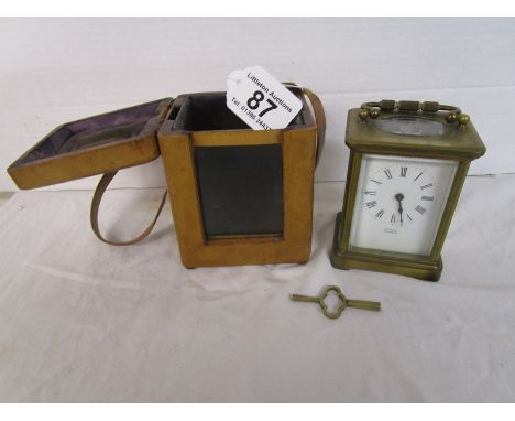 Small leather cased carriage clock