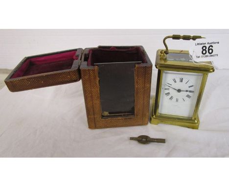 Small leather cased carriage clock