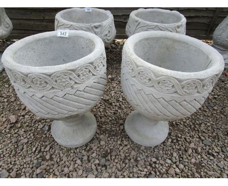 Pair of stone Mayan urns - Circular planters decorated with Aztec design on circular baseGarden stone