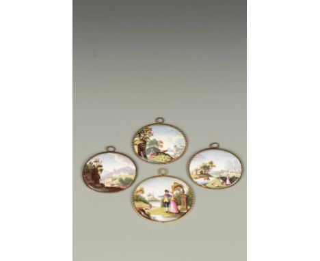 A SET OF FOUR OVAL ENAMEL PLAQUES decorated with figures within landscapes, 3.75", and smaller. See illustration