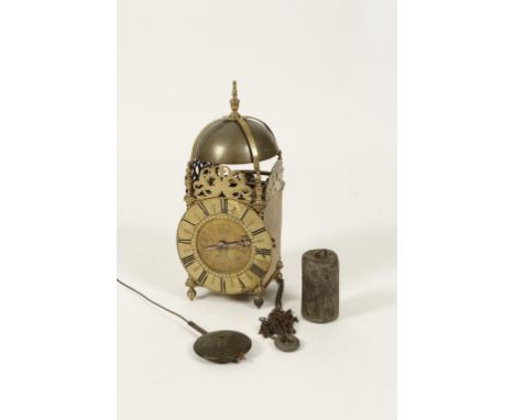 A BRASS LANTERN CLOCK, the dial signed "John Hicks, London", with an arched bell above, with anchor escapement, pendulum and 