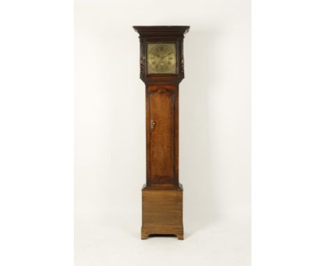 AN OAK LONGCASE CLOCK, the brass dial signed "W. Burton, Kendal" with a thirty hour movement striking on a bell, 79.5" high