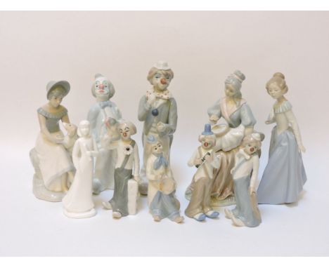 A collection of Nao and other porcelain figures