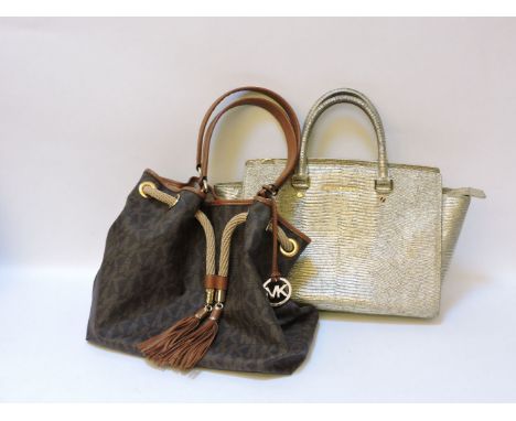A Michael Kors Selma gold metallic tote handbag, in faux reptile skin design, with gold tone hardware, date code AI-1302 and 