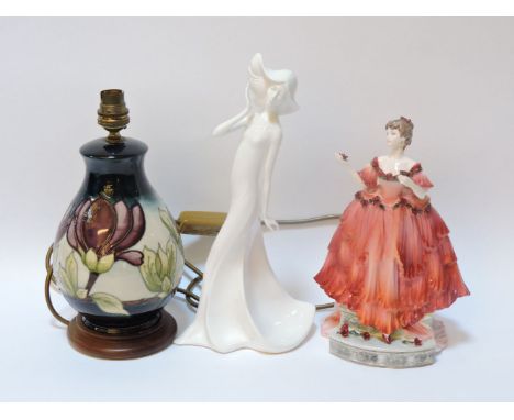 A Coalport figure, a Royal Doulton figure, and a Moorcroft table lamp