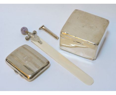 A silver cigarette box, a cigarette case, a letter opener, and a button hole
