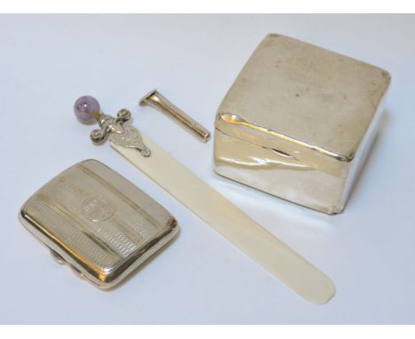 A silver cigarette box, a cigarette case, a letter opener, and a button hole