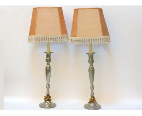 A pair of tall pewter table lamps, 48cm, a late 19th century carved wood and gilded six branch chandelier, each branch leaf s