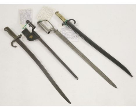 Bayonets, a German 'Yataghan’ sword bayonet, circa 1870, an 1845 pattern socket sword bayonet, a US M1873 Springfield socket 