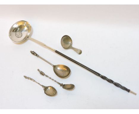 An 18th century silver toddy ladle, with horn handle, a George III caddy spoon, and three silver apostle style spoons