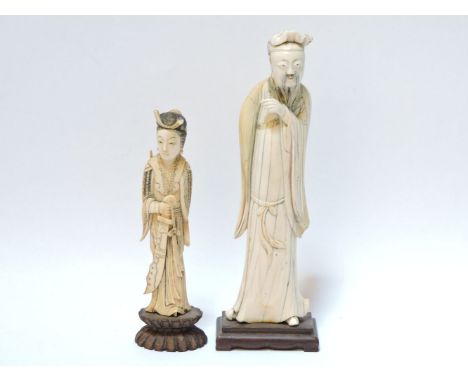 A 19th century Chinese ivory figure of an immortal, 21cm high, and a bone figure, 15cm high