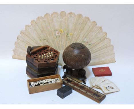 A collection of items, including a Victorian concertina, coconut, cased dominos, prayer books, Victorian bone fan, etc
